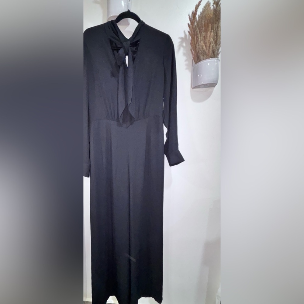 BCBGMaxAzria Black Long Sleeve jumpsuit size with Tie Neck
